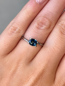 1.12ct oval cut deep blue teal sapphire Adelaide sapphire engagement ring