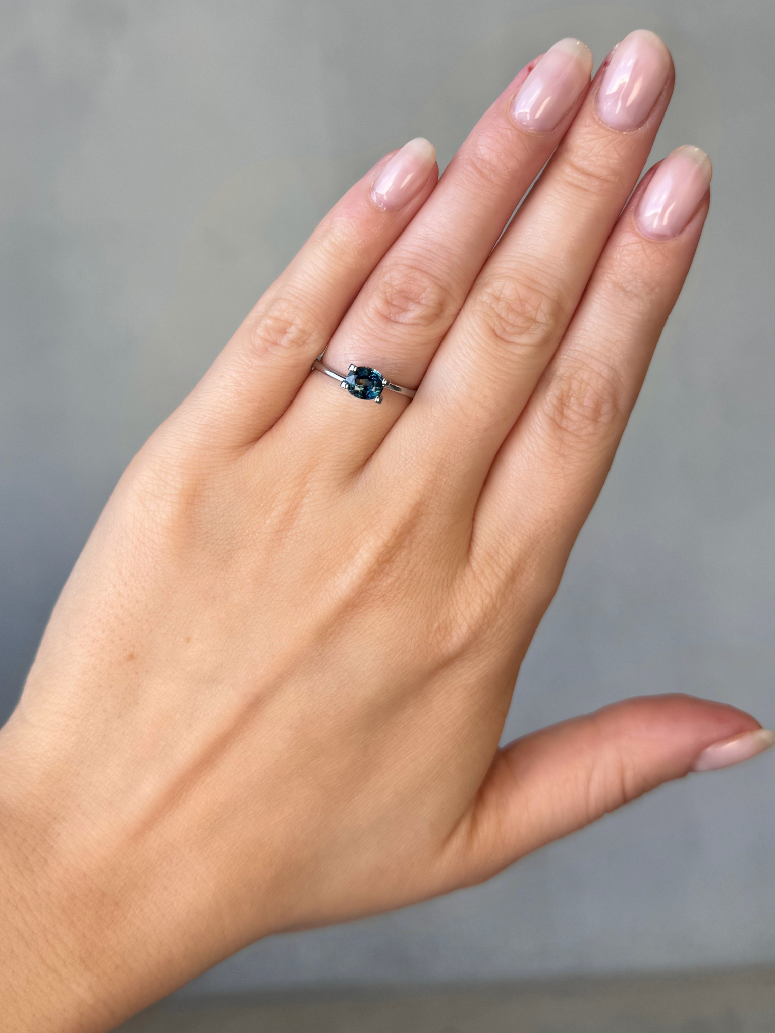 1.12ct oval cut deep blue teal sapphire Adelaide sapphire engagement ring