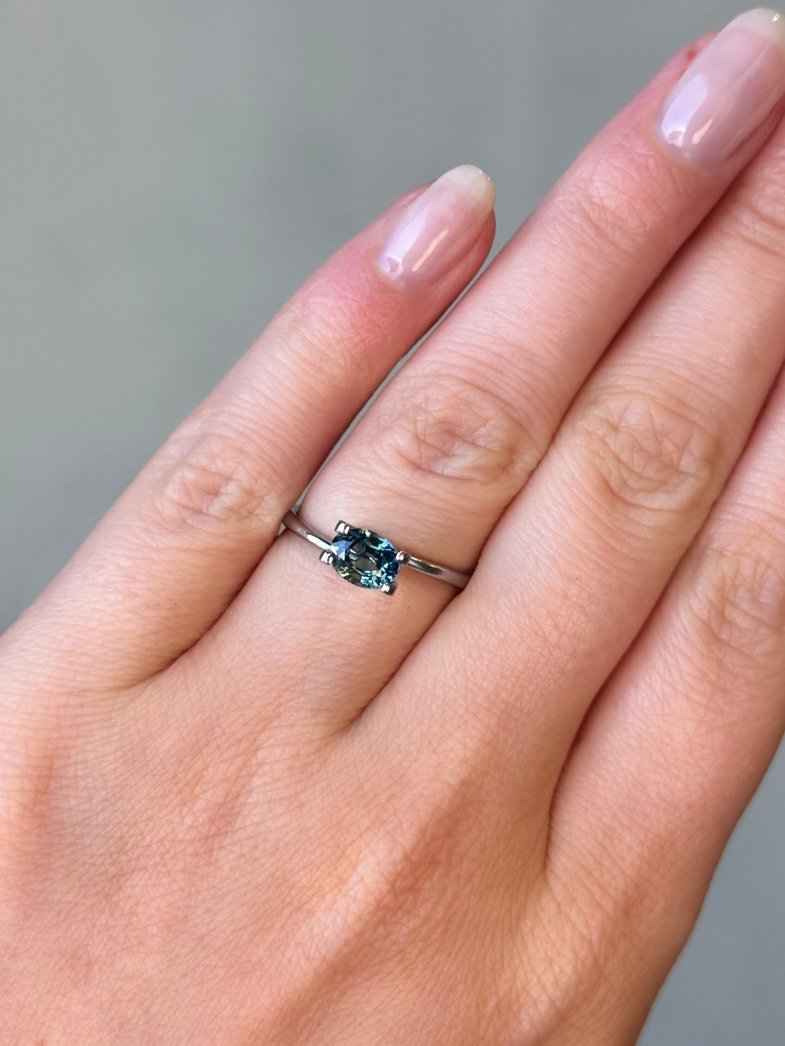 1.17ct oval cut teal sapphire Adelaide sapphire engagement ring