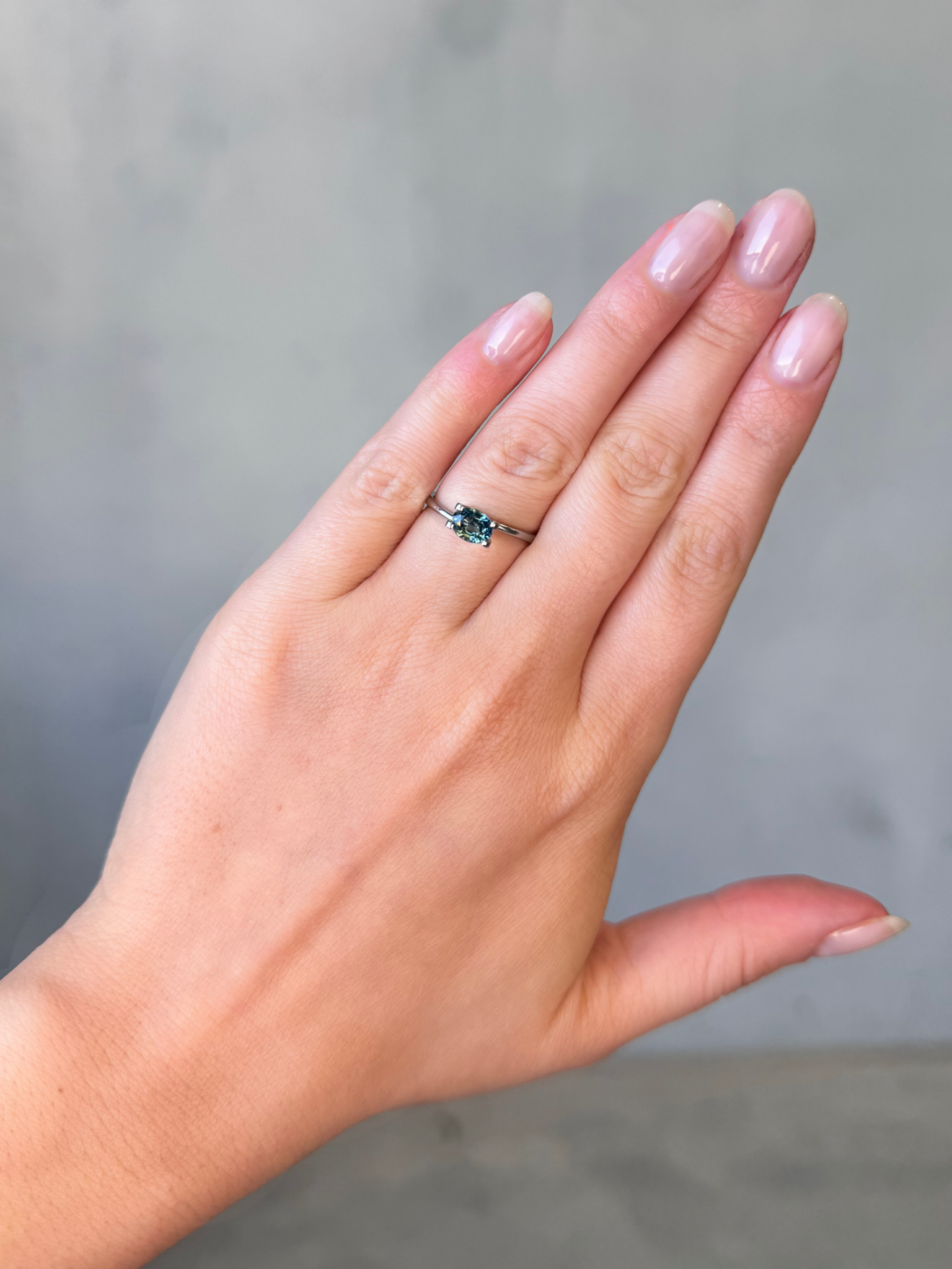 1.17ct oval cut teal sapphire Adelaide sapphire engagement ring