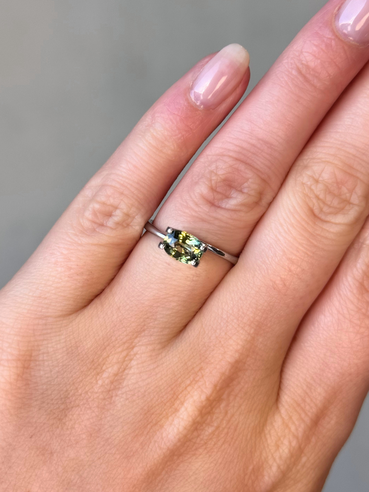 1.19ct oval cut yellow-green sapphire Adelaide sapphire engagement ring