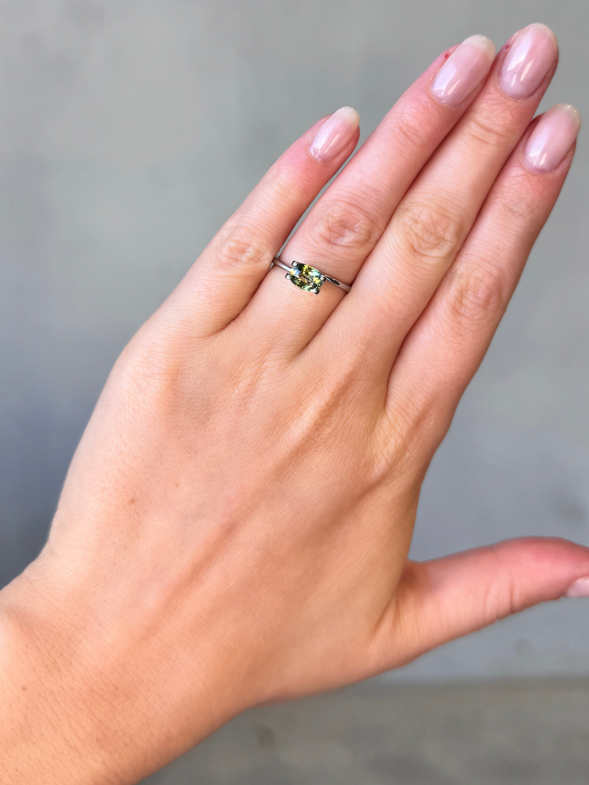 1.19ct oval cut yellow-green sapphire Adelaide sapphire engagement ring