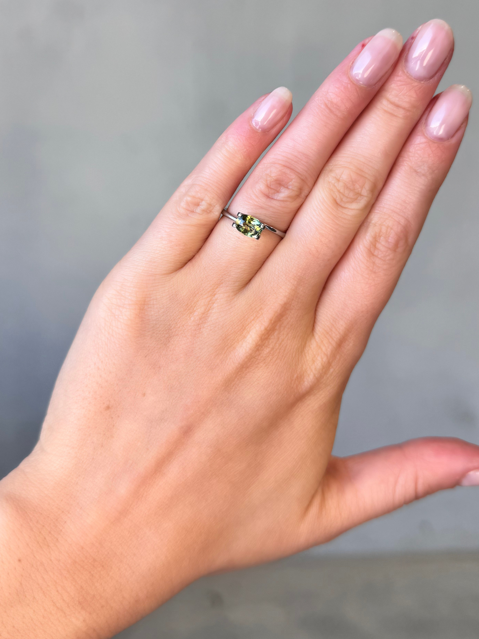 1.19ct oval cut yellow-green sapphire Adelaide sapphire engagement ring