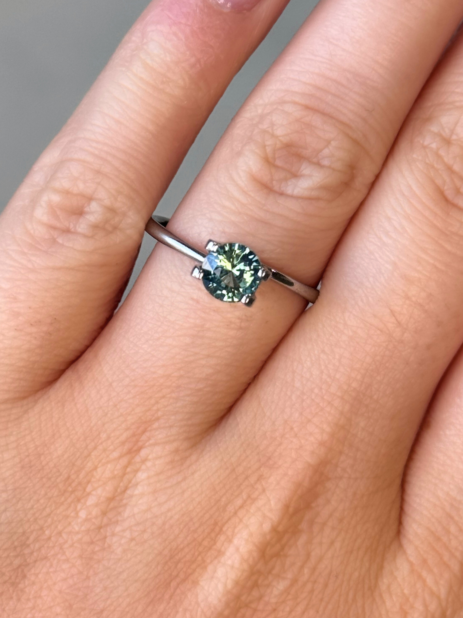 1.21ct round cut teal sapphire Adelaide sapphire engagement ring