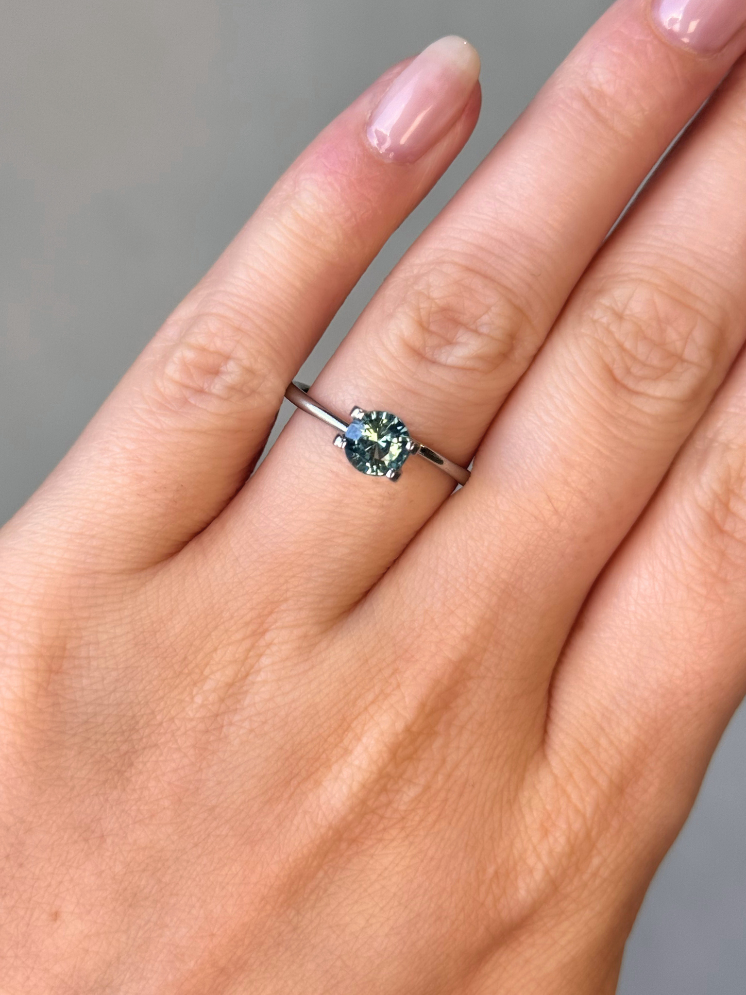 1.21ct round cut teal sapphire Adelaide sapphire engagement ring
