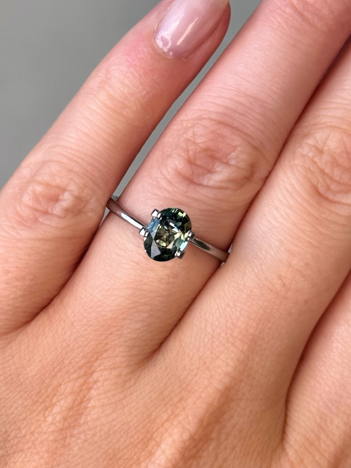 1.29ct oval cut yellow-green sapphire Adelaide sapphire engagement ring