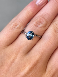 1.82ct oval cut teal sapphire Adelaide sapphire engagement ring