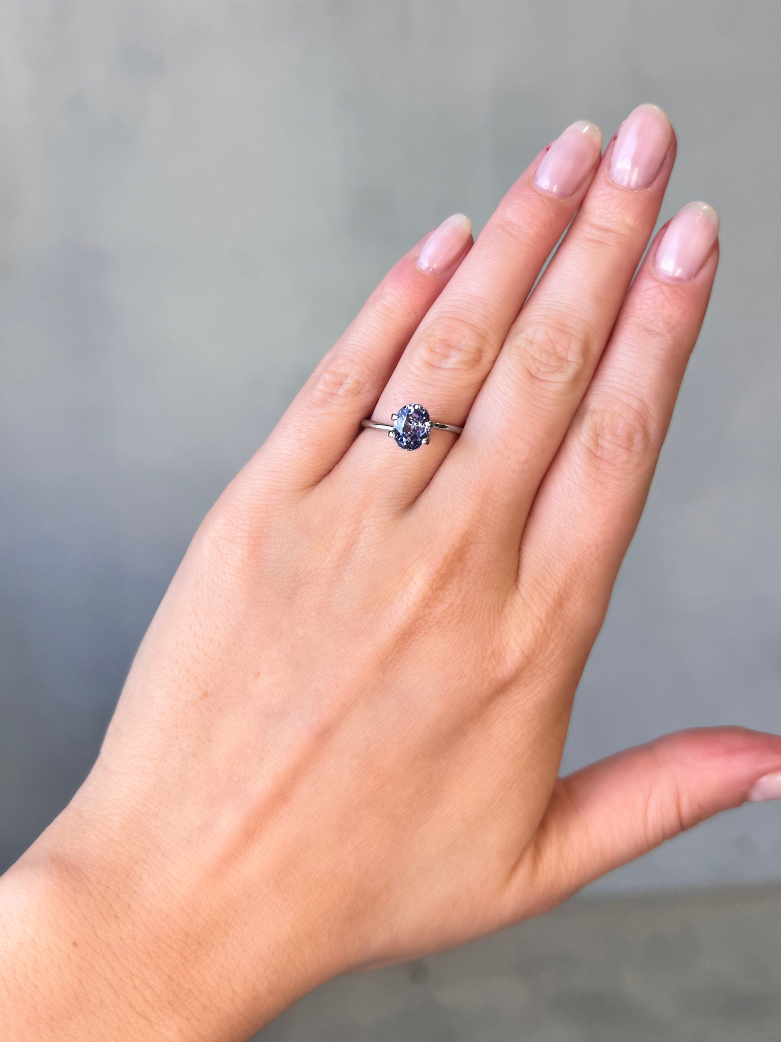 2.04ct oval cut purple sapphire Adelaide sapphire engagement ring