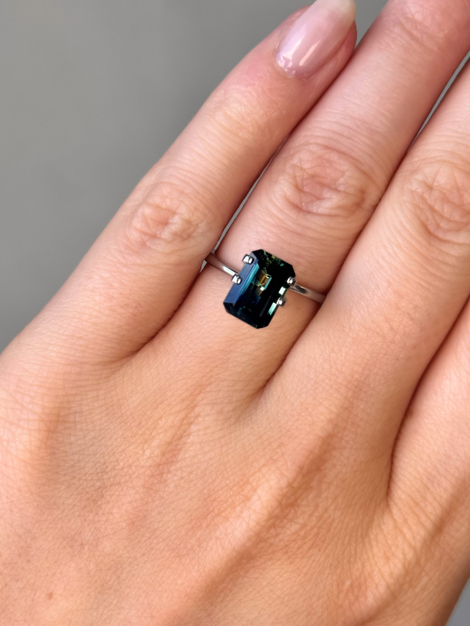 2.95ct emerald cut parti sapphire Adelaide sapphire engagement ring