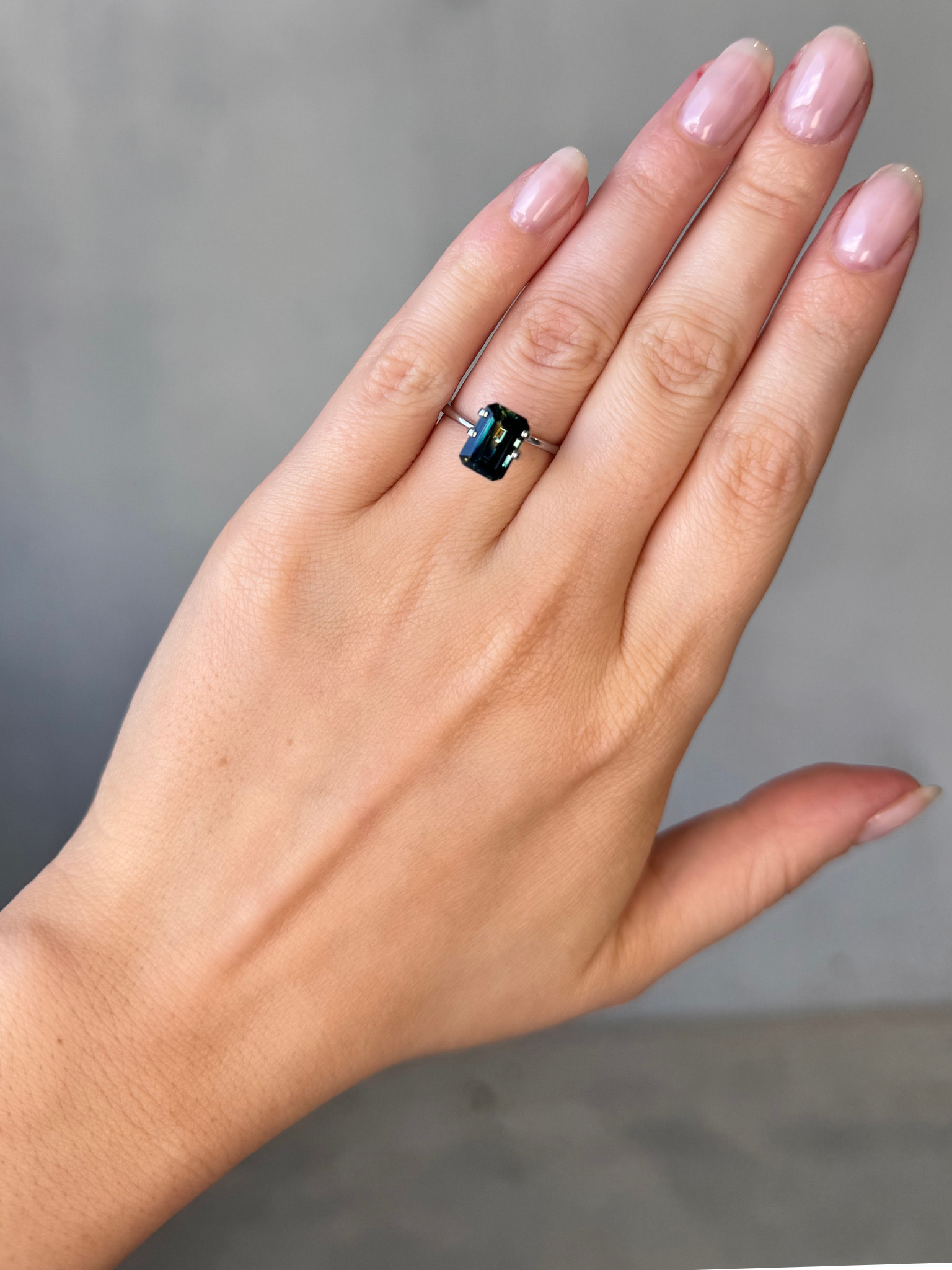 2.95ct emerald cut parti sapphire Adelaide sapphire engagement ring