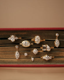 Clara Round Diamond Three Stone Engagement Ring