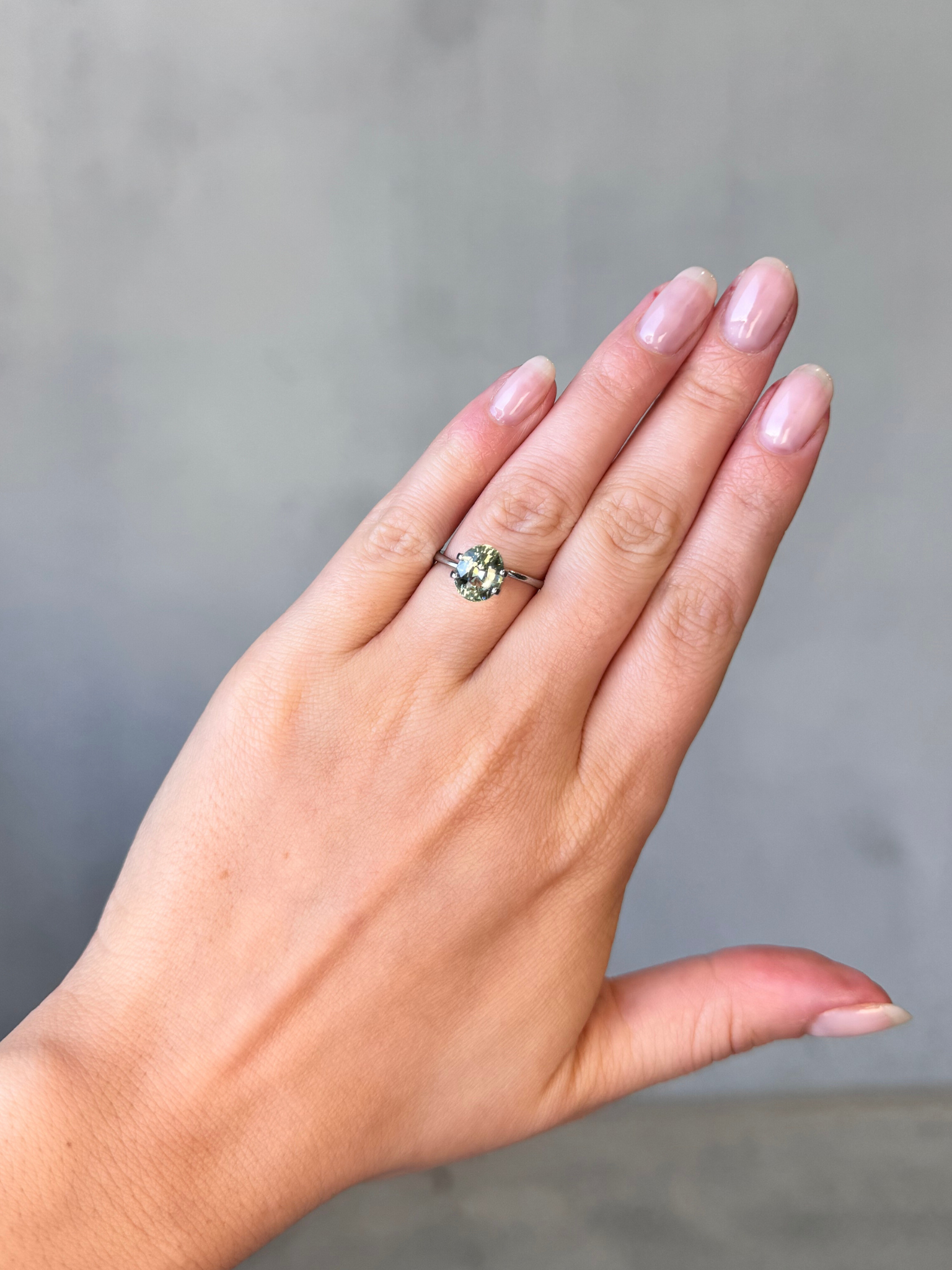 3.00ct oval cut pastel green sapphire Adelaide sapphire engagement ring