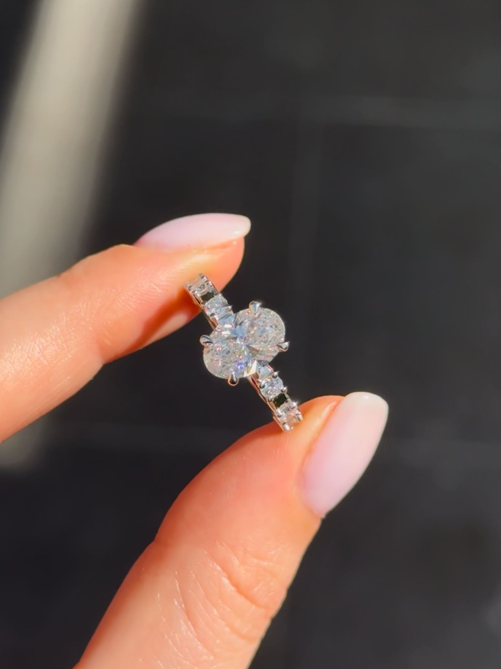 Oval Diamond Solitaire with Diamond Claw Set Band