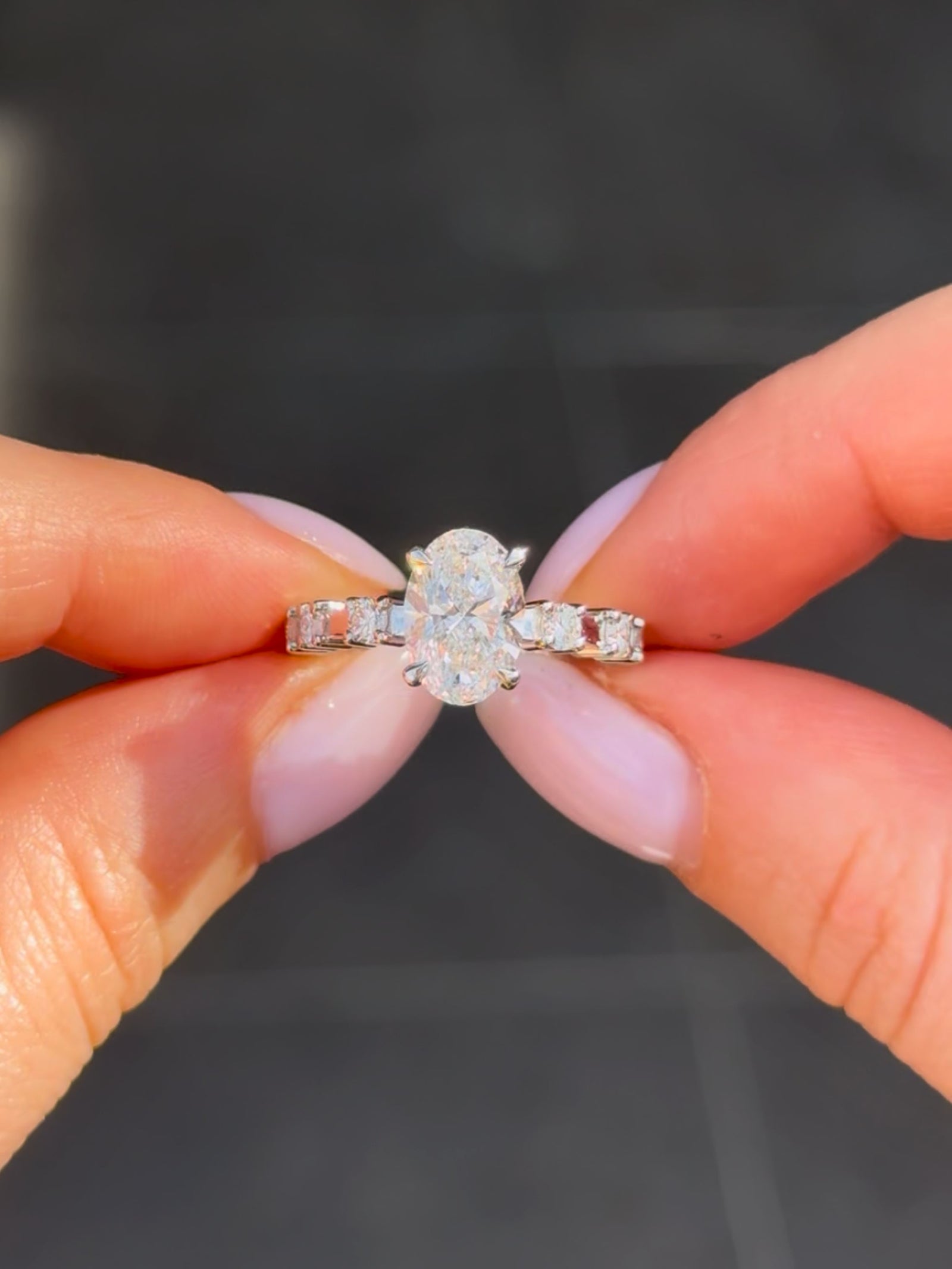 Oval Diamond Solitaire with Diamond Claw Set Band