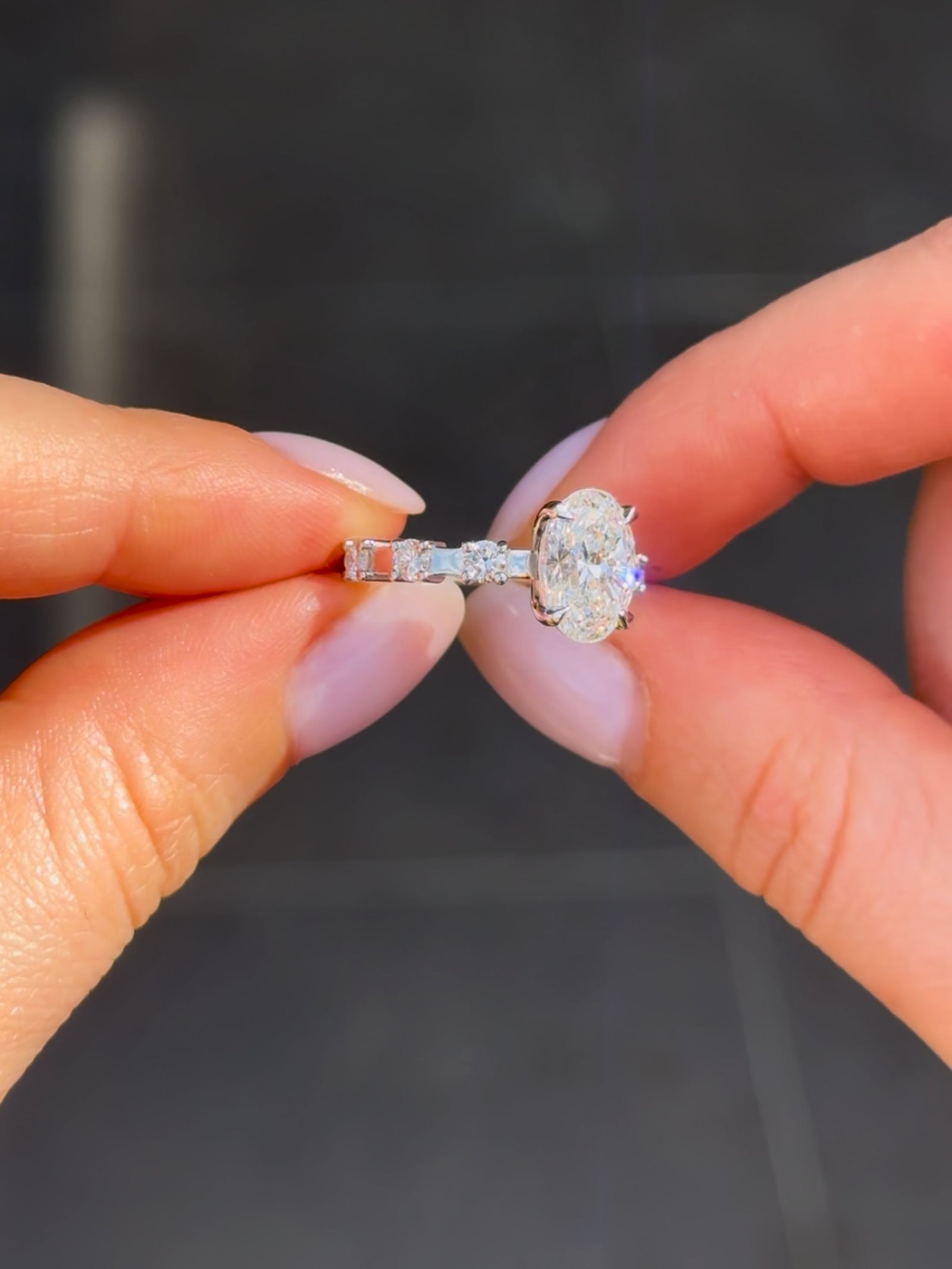 Oval Diamond Solitaire with Diamond Claw Set Band