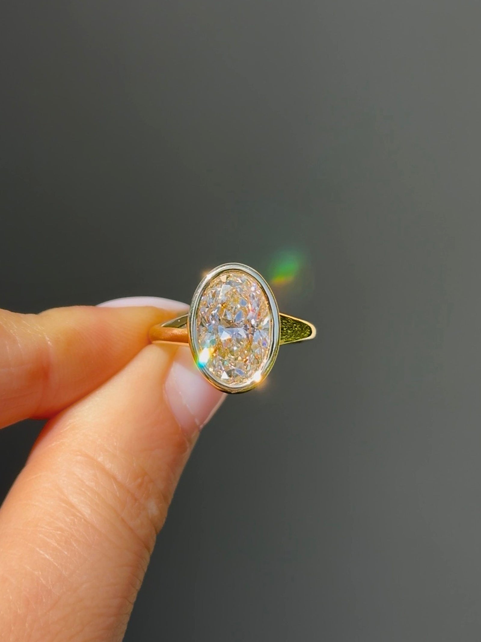Bezel Set Oval Diamond Signet Solitaire