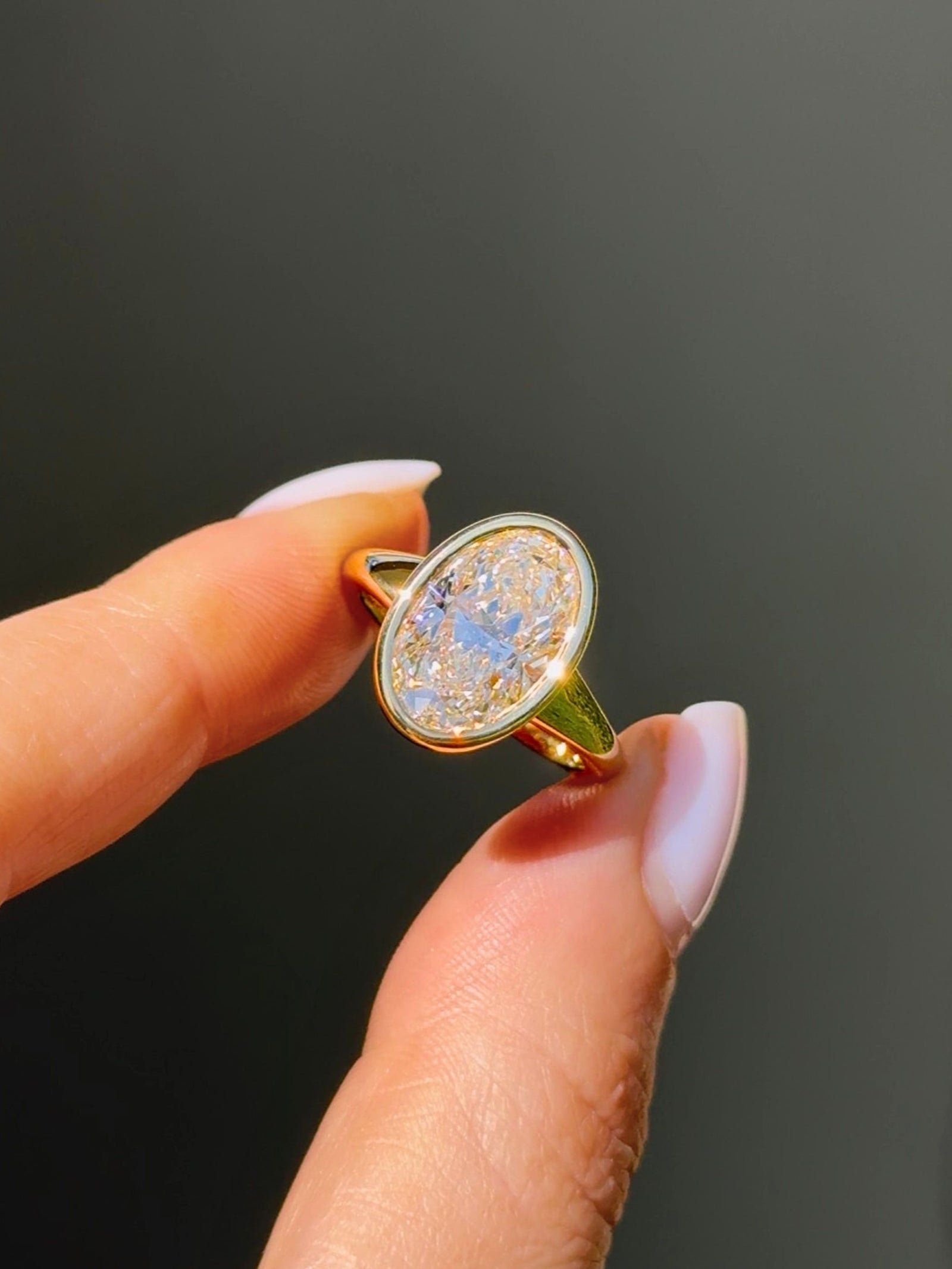 Bezel Set Oval Diamond Signet Solitaire