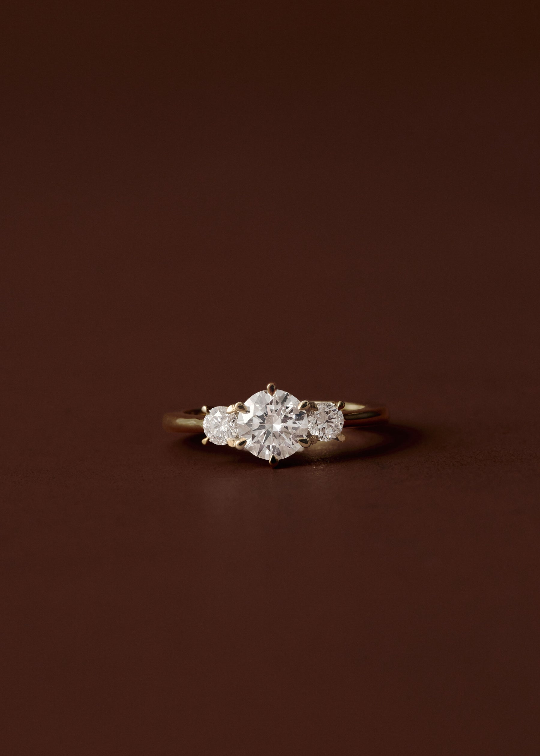 Clara Round Diamond Three Stone Engagement Ring