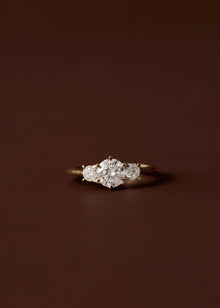 Clara Round Diamond Three Stone Engagement Ring