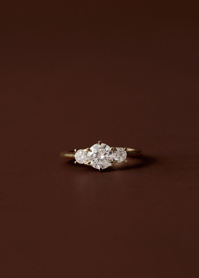 Clara Round Diamond Three Stone Engagement Ring
