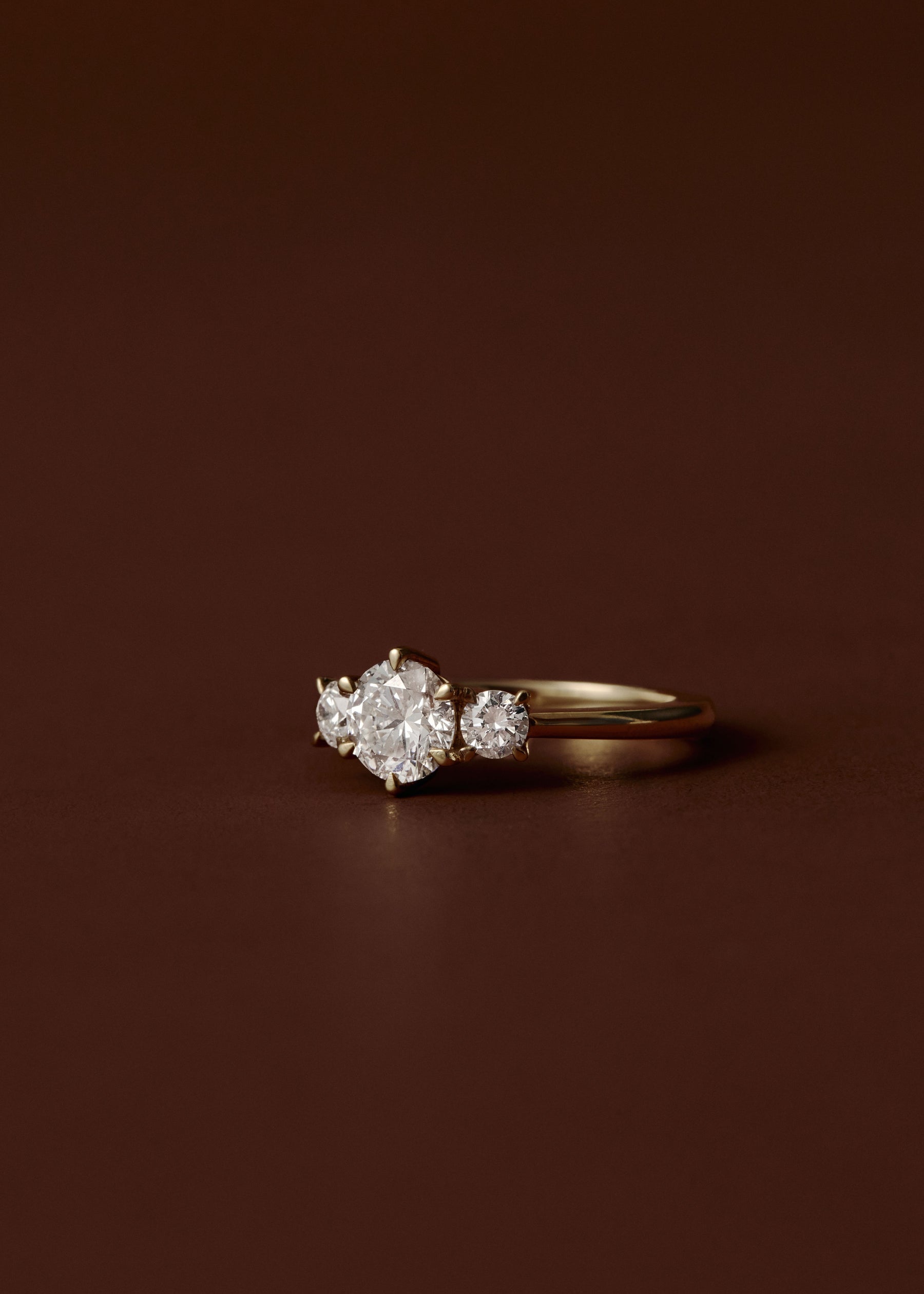 Clara Round Diamond Three Stone Engagement Ring