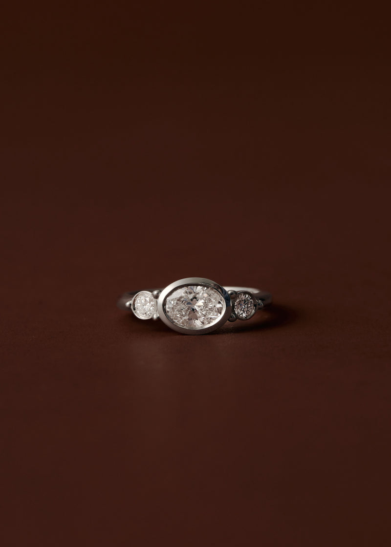 Olivia Three Stone Bezel Engagement Ring