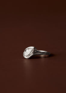 1.50ct Pear diamond engagement ring with sculpted semi bezel setting and double wire band